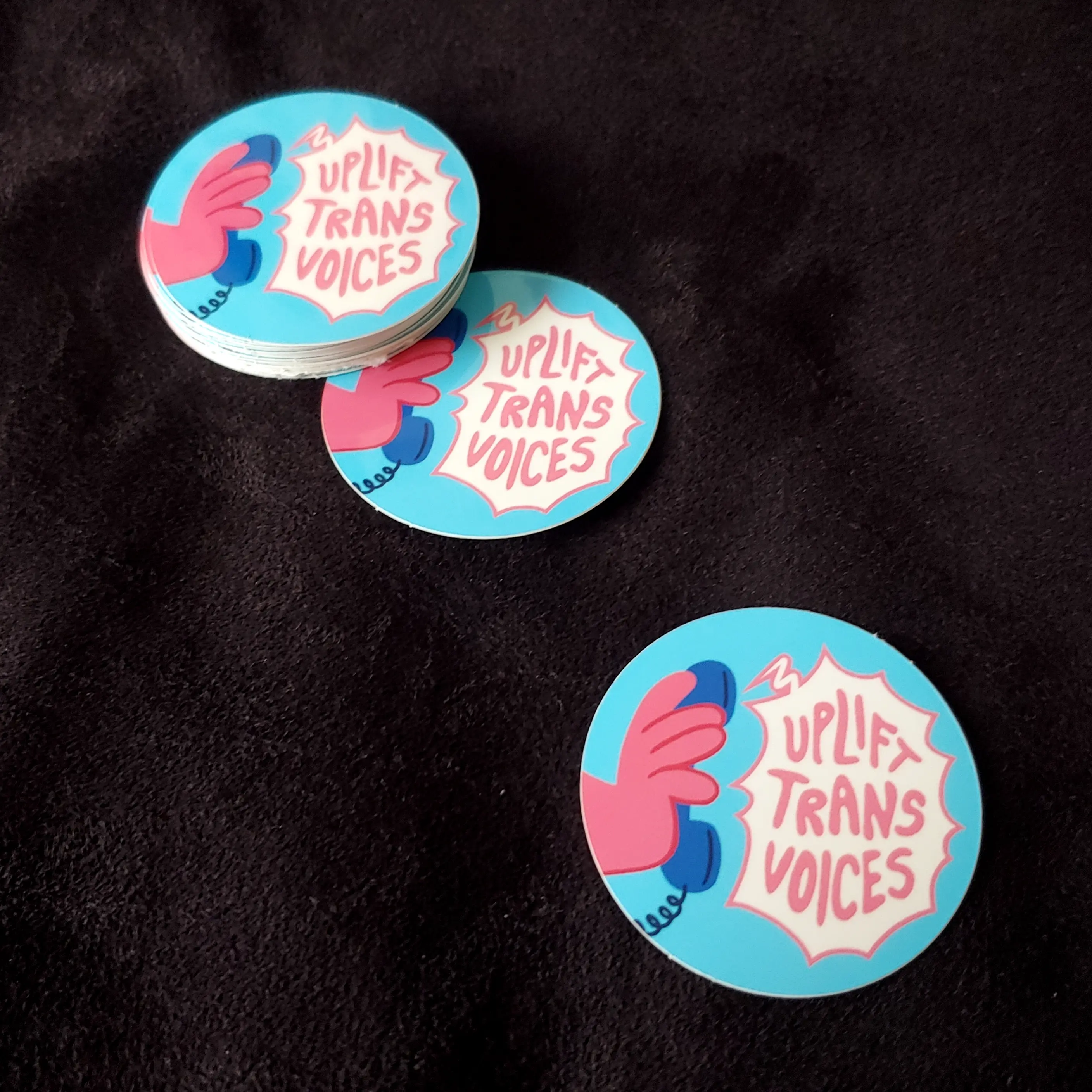A pile of the physical stickers.
